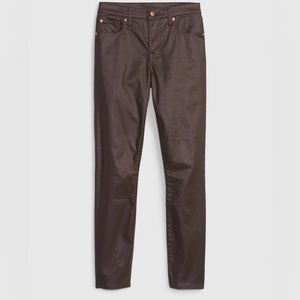 Mid Rise Coated Denim True Skinny Jeans Never been worn